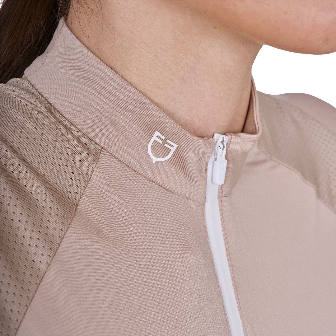 Polo technique femme à manches courtes et fermeture éclair