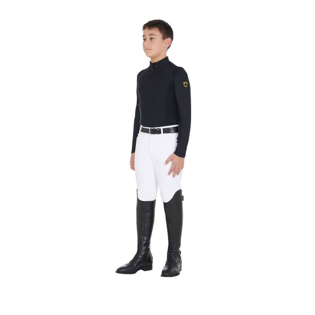 Entrenamiento de polo  Base layer bambino da allenamento in tessuto tecnico 64,75 € Entrenamiento de polo  Base layer bambino da allenamento in tessuto tecnico 64,75 €