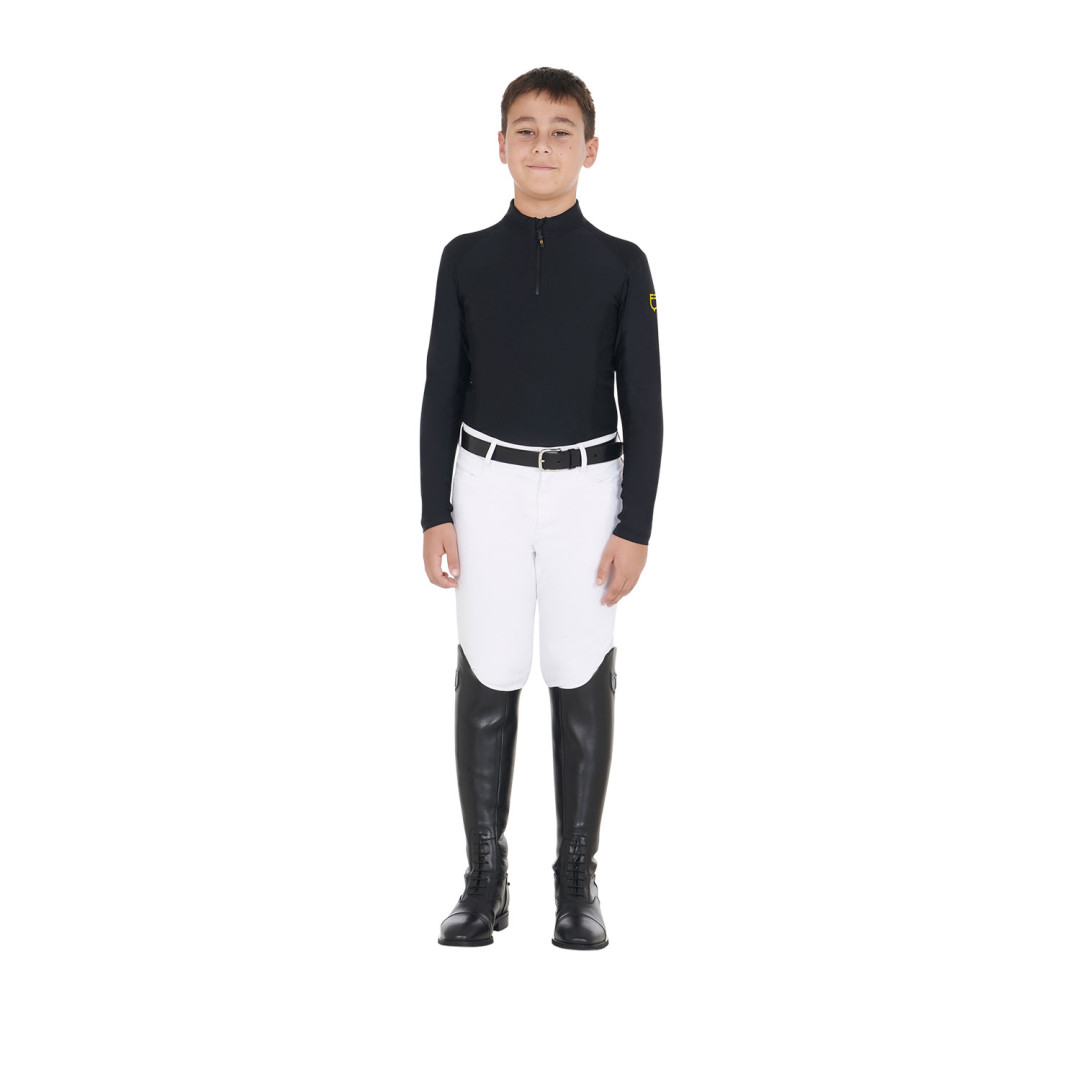 Entrenamiento de polo  Base layer bambino da allenamento in tessuto tecnico 64,75 € Entrenamiento de polo  Base layer bambino da allenamento in tessuto tecnico 64,75 €