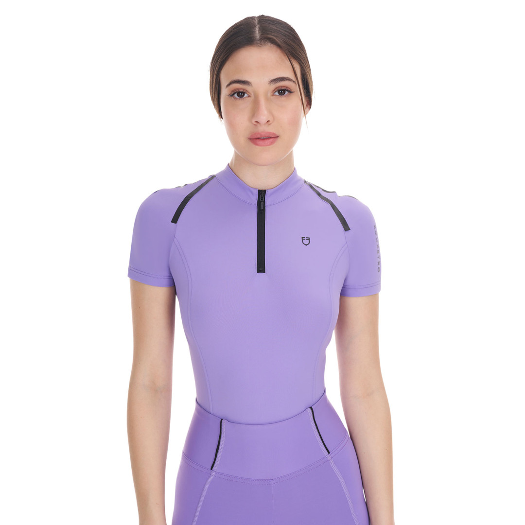 Entrenamiento de polo  Polo donna da allenamento a body con zip 80,33 € Entrenamiento de polo  Polo donna da allenamento a body con zip 80,33 €